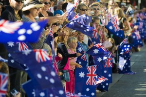 spectators with flags at anzac day parade in fremantle, western australia, australia